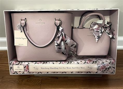 (33) $29. . Nanette lepore matching handbag set for mom and her mini
